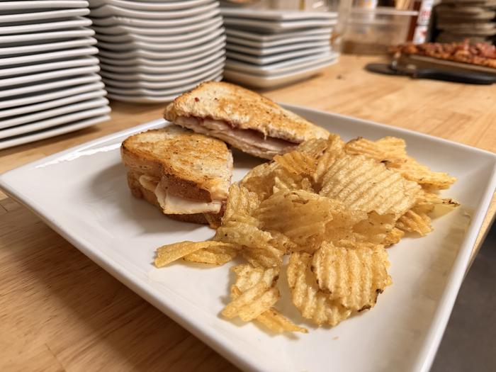 Cranberry turkey sandwich with kettle chips